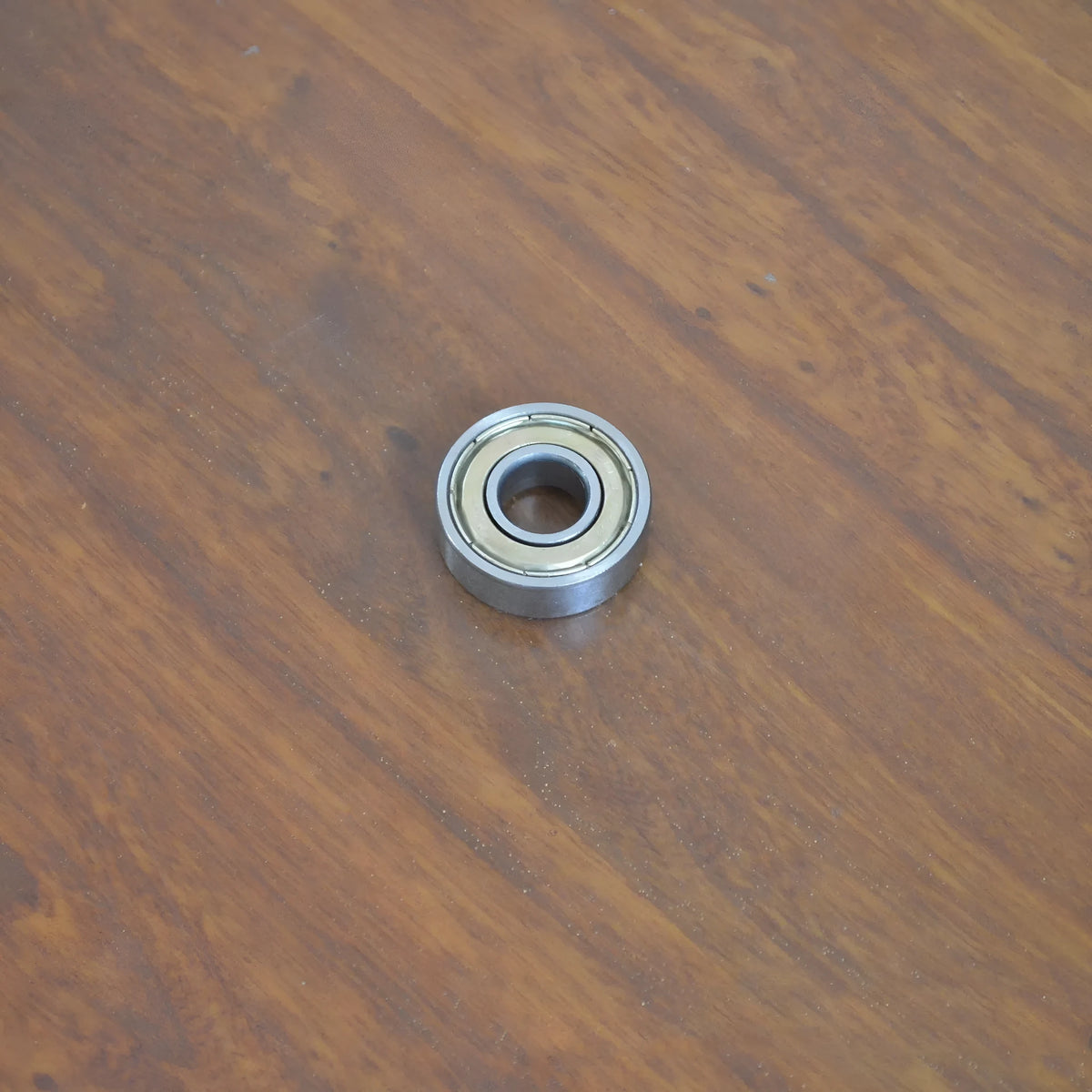 6000ZZ carbon steel ball bearing with 10x26x8mm dimensions and metal shields.