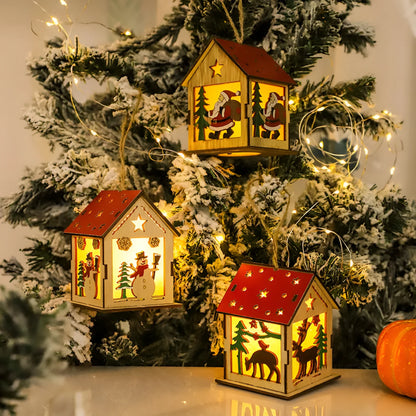 Wooden festive pendant with LED illumination in snowman, Santa Claus, or elk design measuring 7cm by 7cm by 9cm