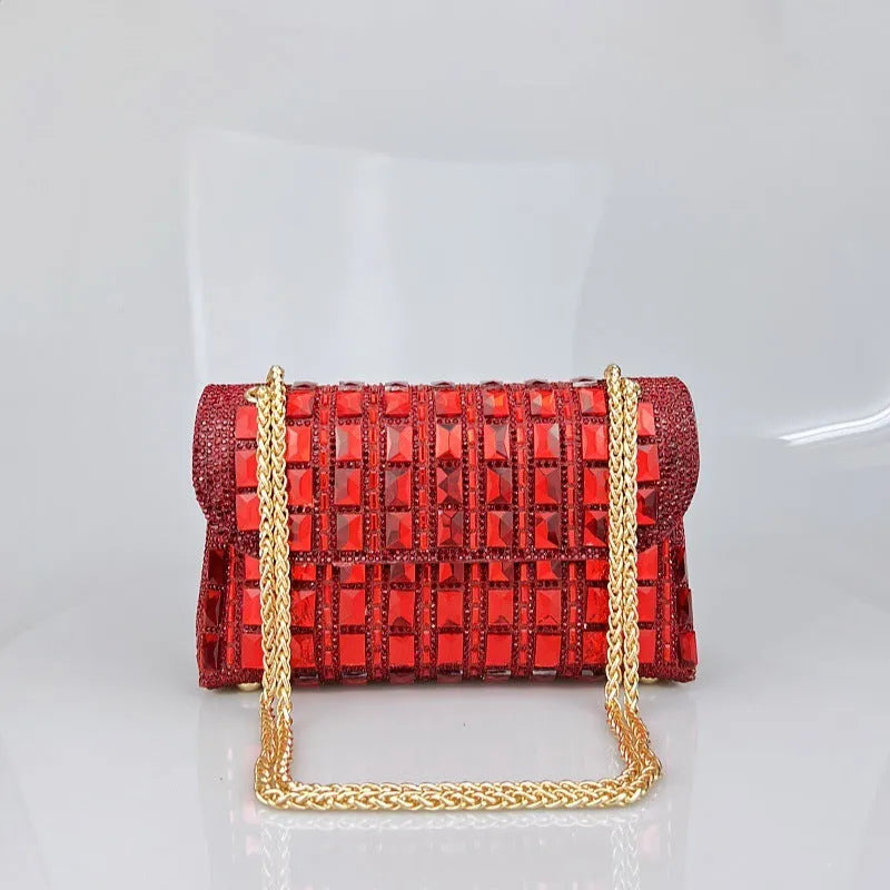 Silver rhinestone-decorated PU leather clutch bag with a metal chain strap, shown open to reveal interior phone pocket.