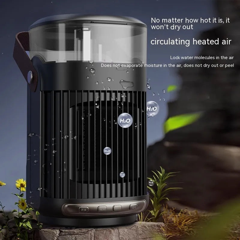 Black portable heater with humidifier measuring 24x13x13cm with front control panel and shaking head mechanism