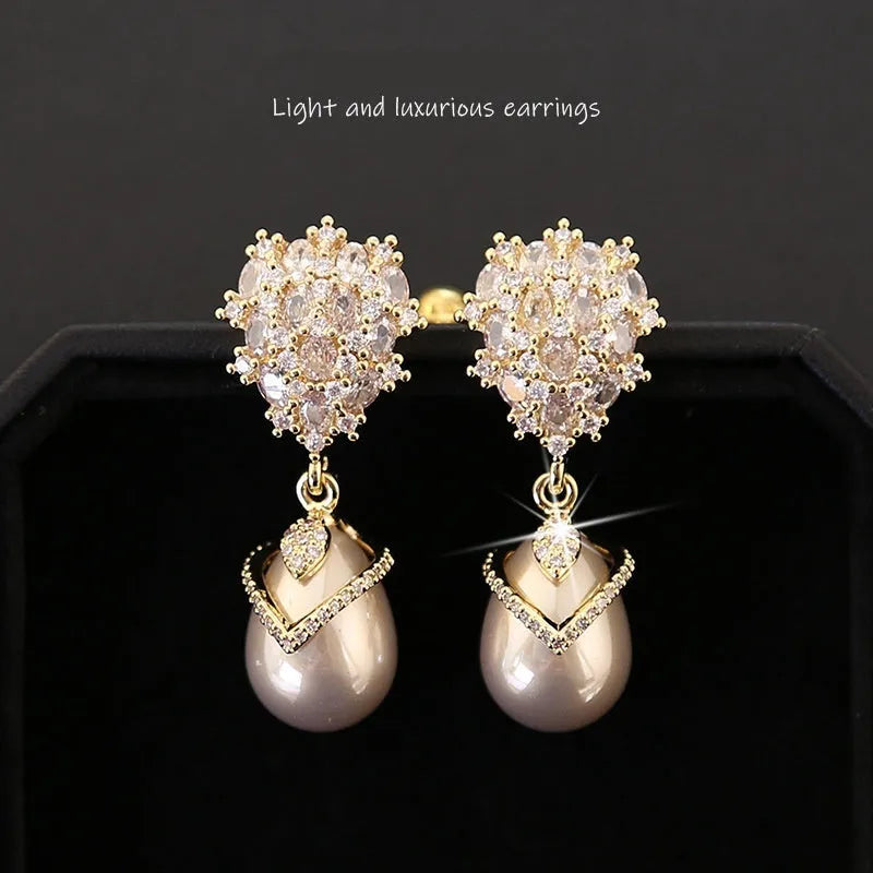 Women's drop pearl earrings with zircon inlay on 18K gold-plated copper setting