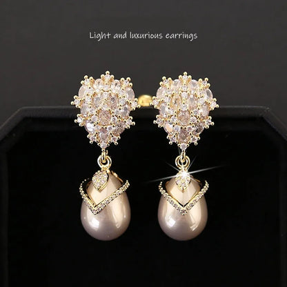 Women's drop pearl earrings with zircon inlay on 18K gold-plated copper setting