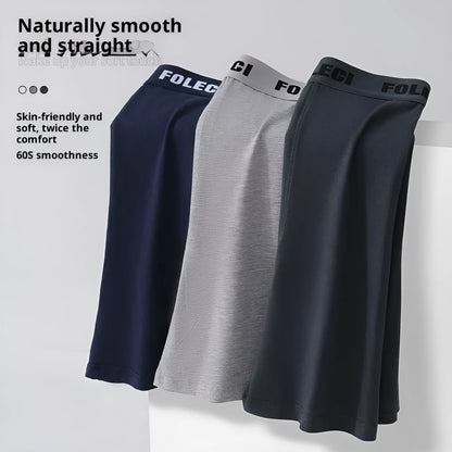 Men's pure cotton lengthened boxer briefs with anti-wear legs and high waist, available in five solid colours, sizes XL to 8XL.
