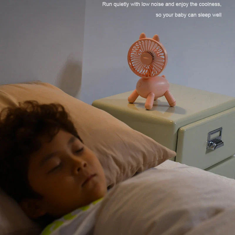 Compact portable USB-powered desktop cooling fan with adjustable airflow and shaking head