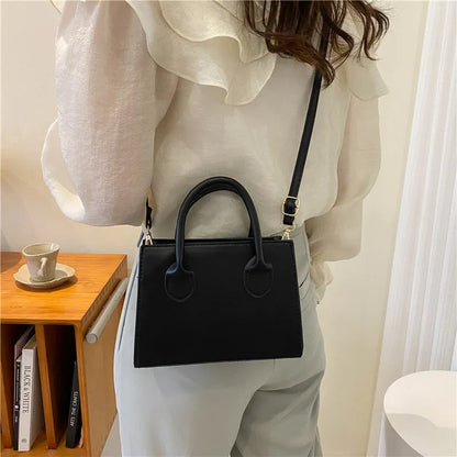 Women's small square PU leather shoulder bag in five colour options showing retro street styling