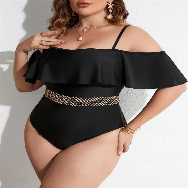 Black solid colour one-piece swimsuit for women on a mannequin.