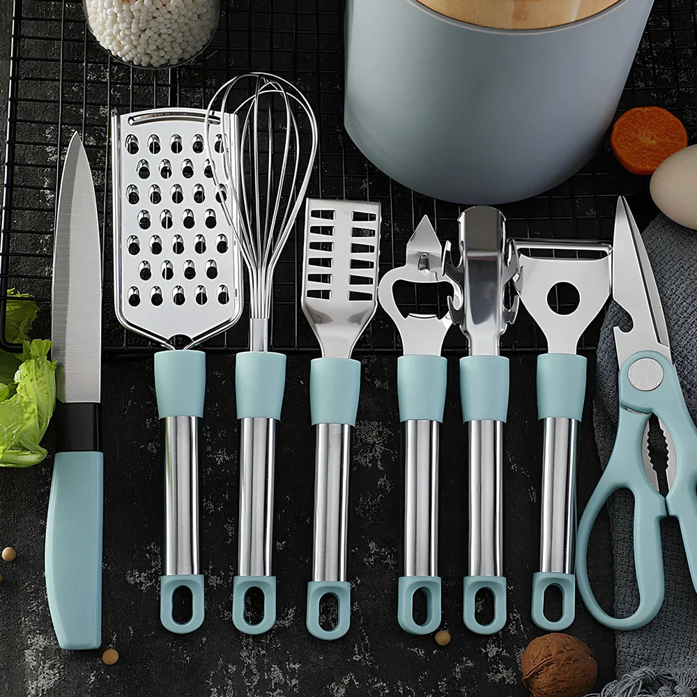 6-piece grey stainless steel kitchen utensil set with whisk, peeler, scissors on white background, essential for quick prep