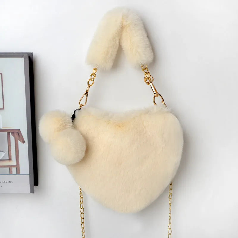 Plush heart-shaped women's handbag in medium size with removable shoulder strap