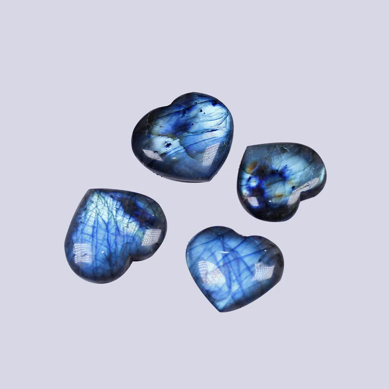 Natural crystal pendant jewellery piece made from pulled feldspar stone in a modern heart shape with an ocean blue moonlight colour tone, available in five sizes from 22mm to 45mm for creating unique necklaces and accessories.