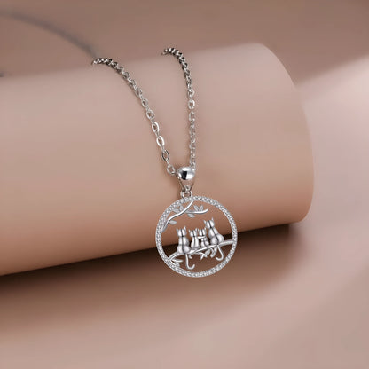 Four kitten necklace with copper pendant and cross chain, cat design jewellery