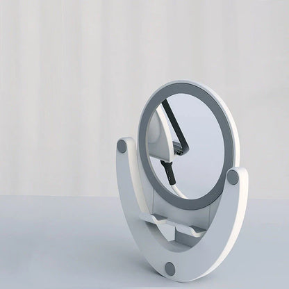 Adjustable phone stand with built-in makeup mirror for hands-free viewing and on-the-go grooming