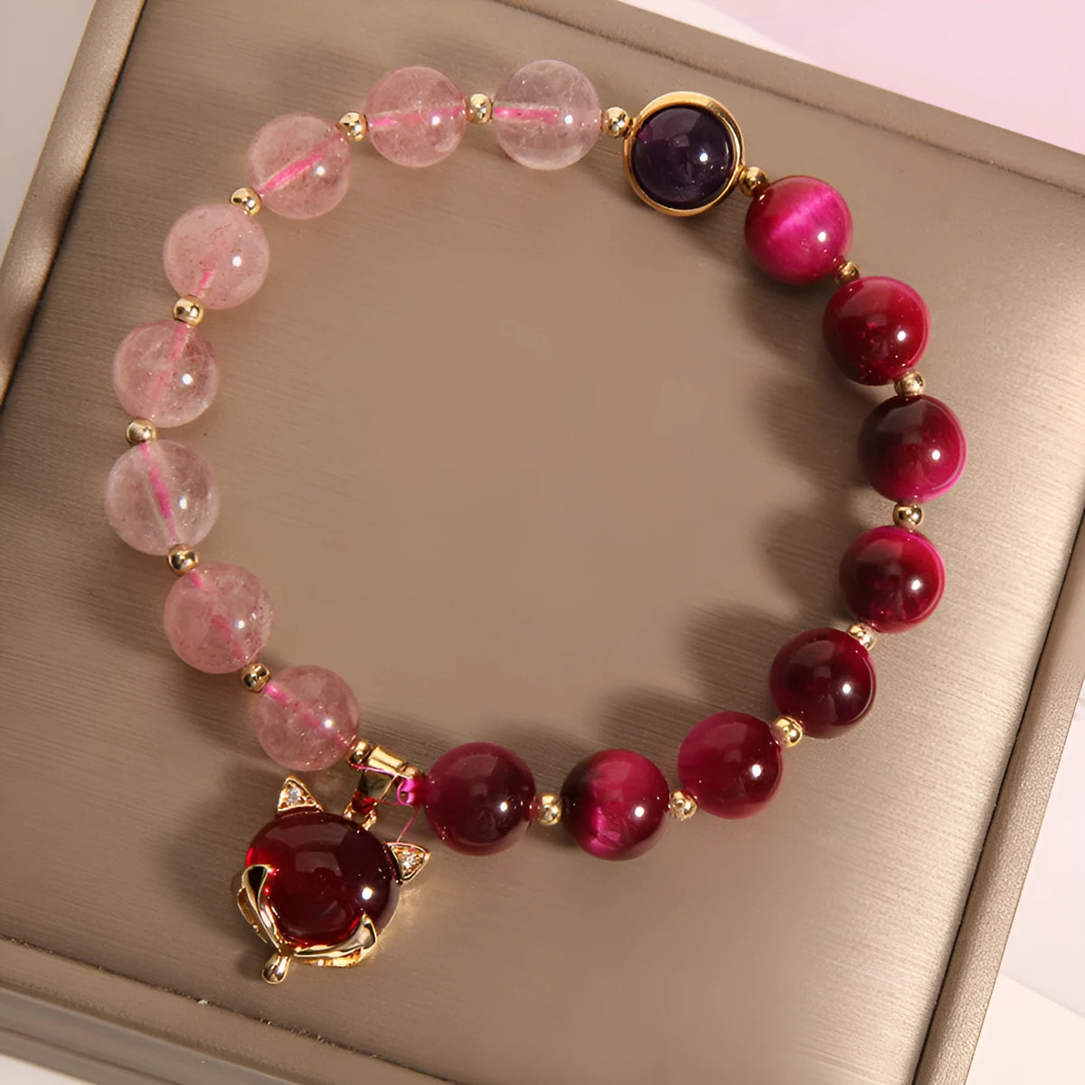 Women's elastic bracelet with strawberry crystal on a stretchy rope band.