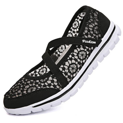 Women's beige lace-up casual flat shoes with a breathable mesh upper and round toe.