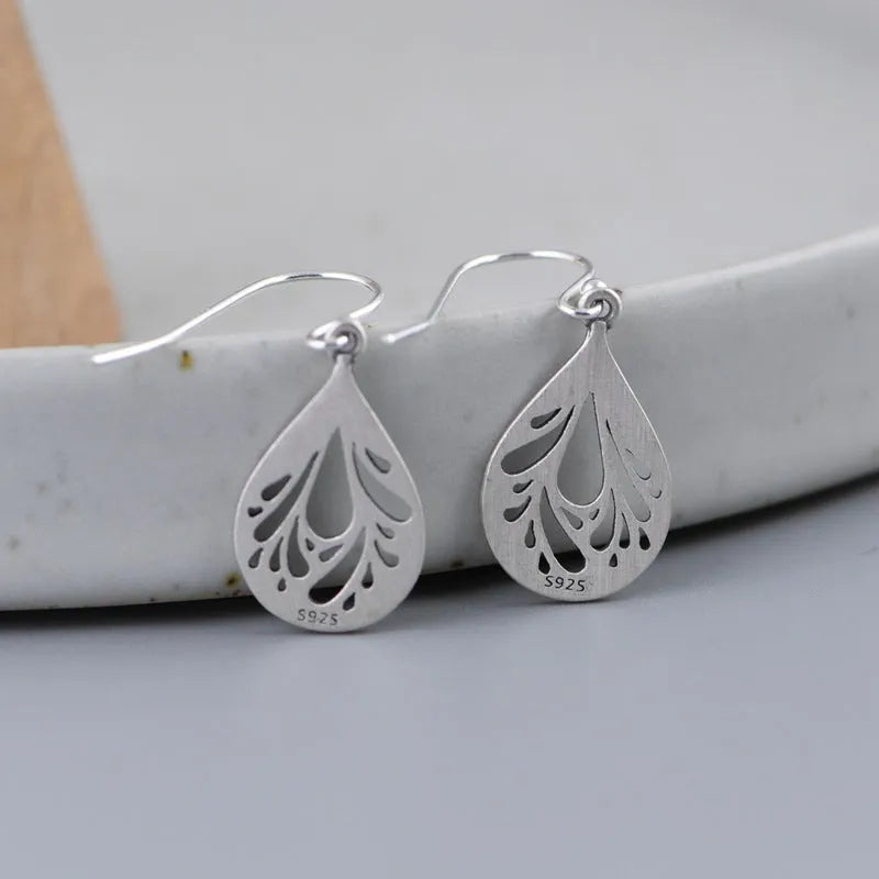 Women's retro hollow water drop silver earrings with small exquisite drop shape design