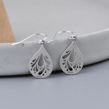 Women's retro hollow water drop silver earrings with small exquisite drop shape design