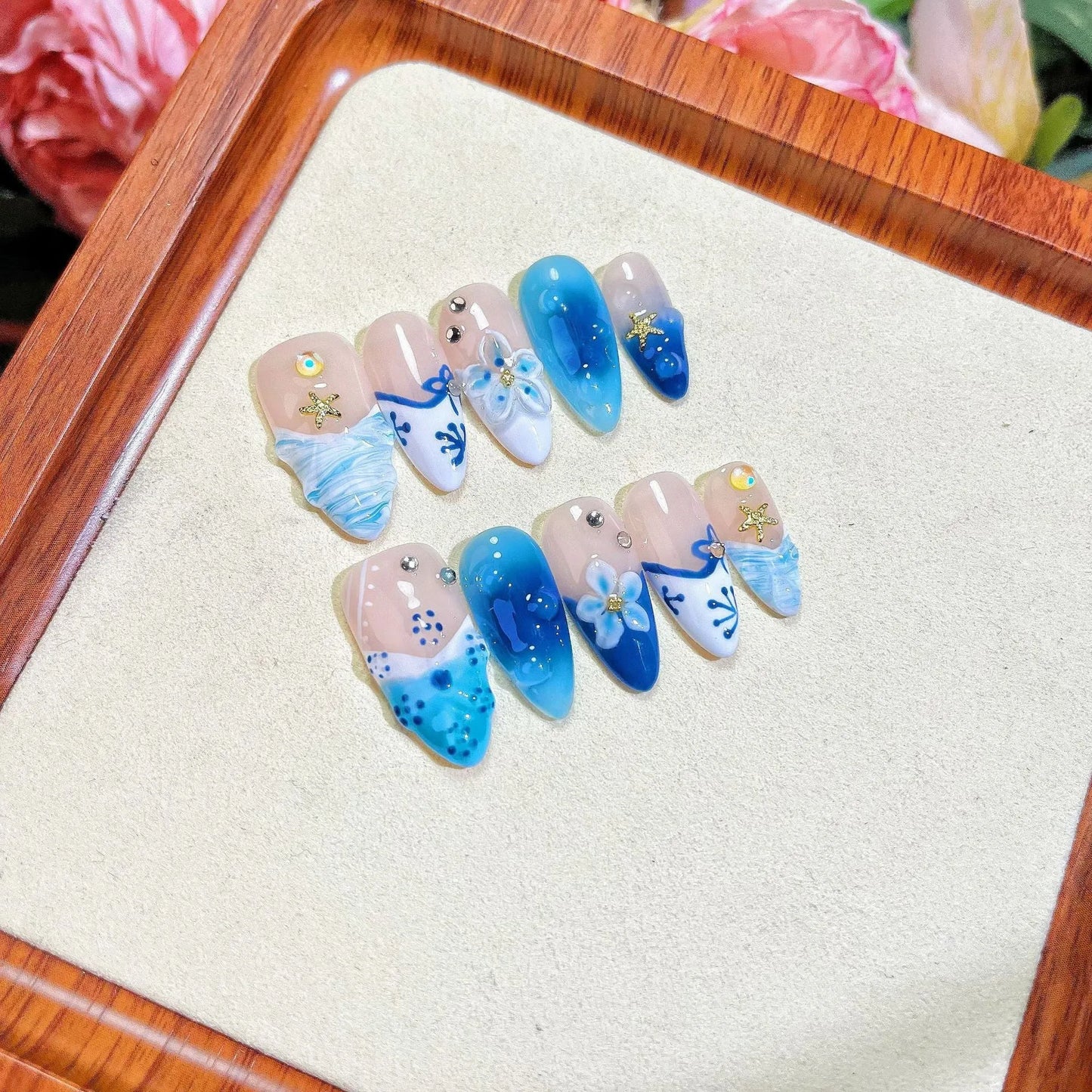 Blue hand-painted carved summer ice transparent wear fake nails set with plastic wearable armour in sizes XS, S, M, L