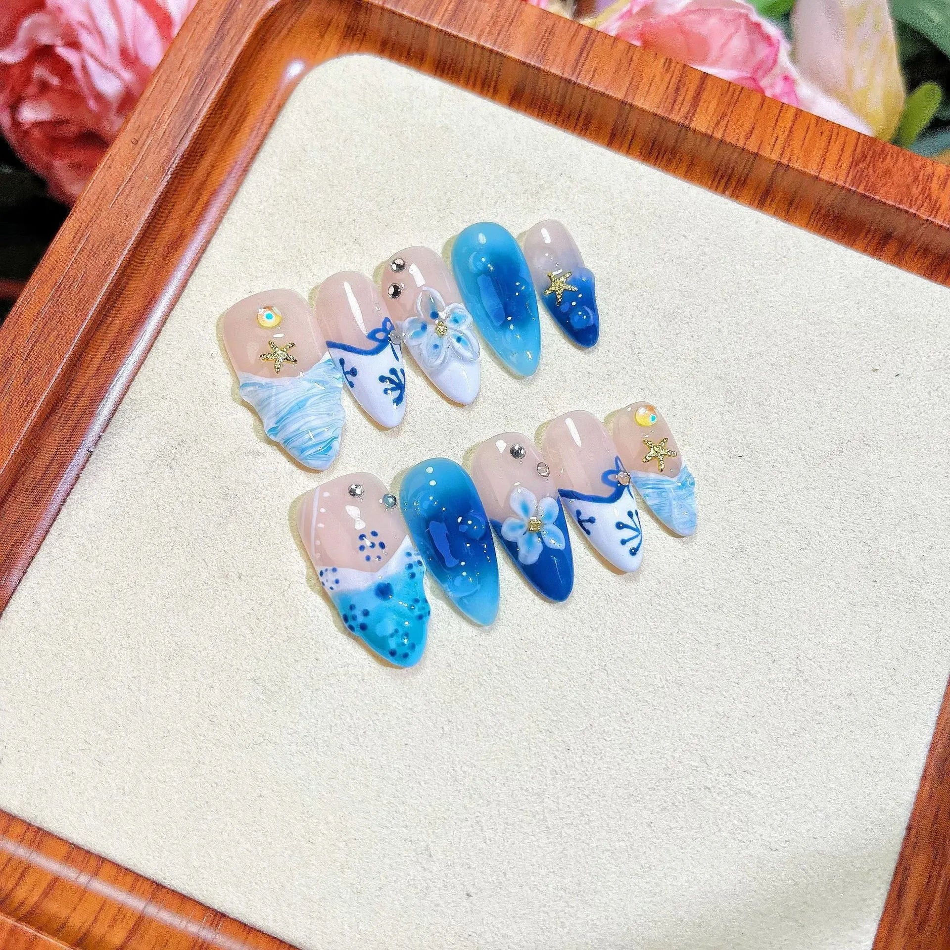 Blue hand-painted carved summer ice transparent wear fake nails set with plastic wearable armour in sizes XS, S, M, L