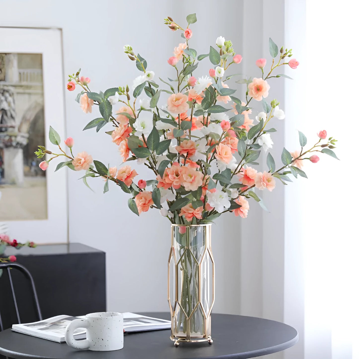 Artificial silk camellia flower in a vase, colours include white, pink, rose pink, and orange coffee.