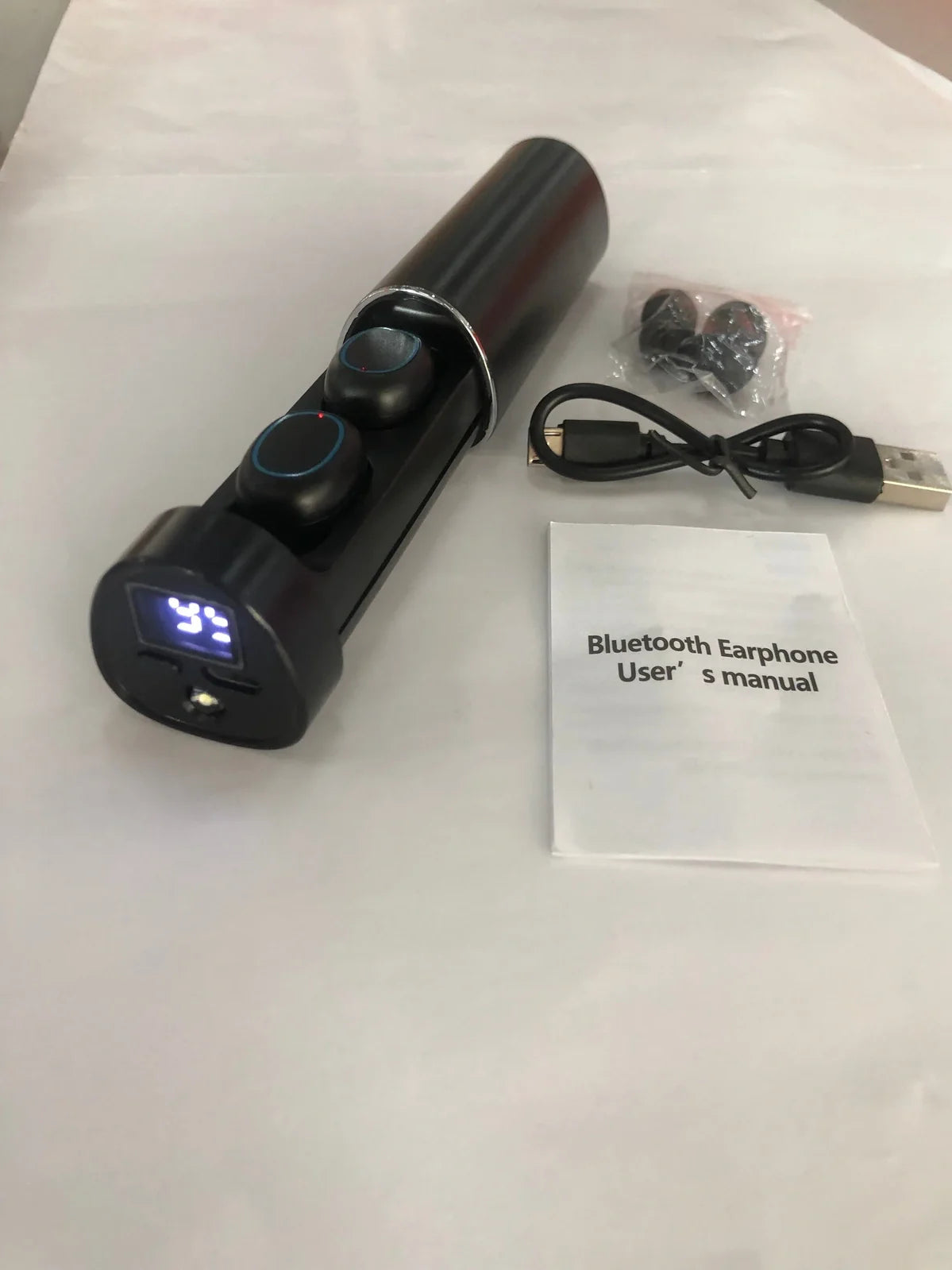 Mini portable pull-out Bluetooth headset in charging case with multiple colour options