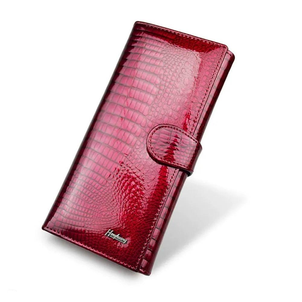 Women's patent leather coin purse with crocodile pattern in red colour option