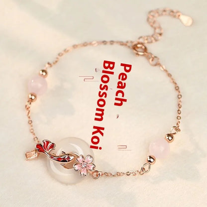 Women's S925 sterling silver bracelet with white chalcedony flowers and geometric koi fish charm