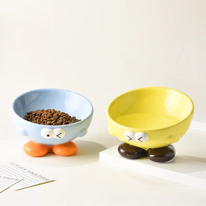 Ceramic slanted pet bowl with decorative expression pattern in blue colour