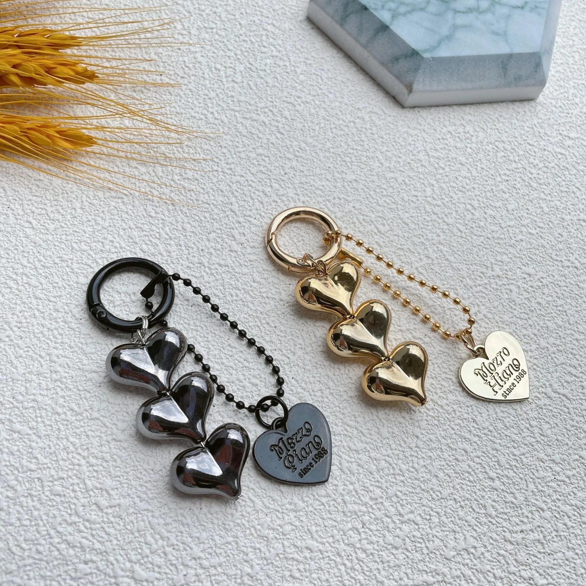 Acrylic peach-shaped key ring with love heart design and electroplated finish