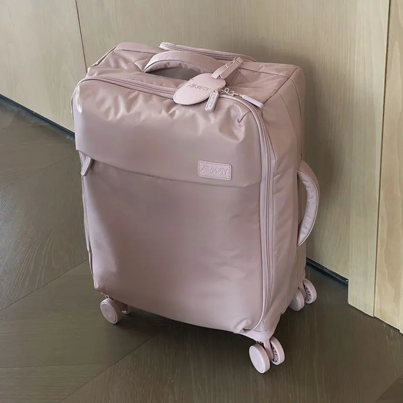 Ultra-light waterproof Oxford cloth suitcase in bluestone green with universal wheels showing 20-inch size dimensions