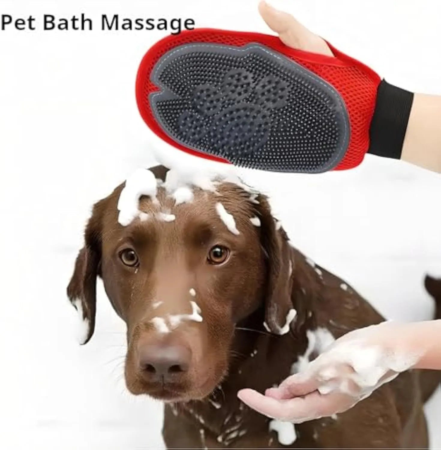 Red pet bathing glove with integrated brush bristles, measuring 26cm by 16cm, shown fitting on a hand