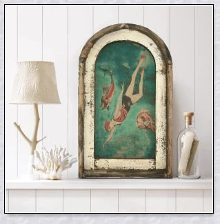 Decorative wall art featuring multiple swimmers and mermaids in a serene, aquatic-themed design