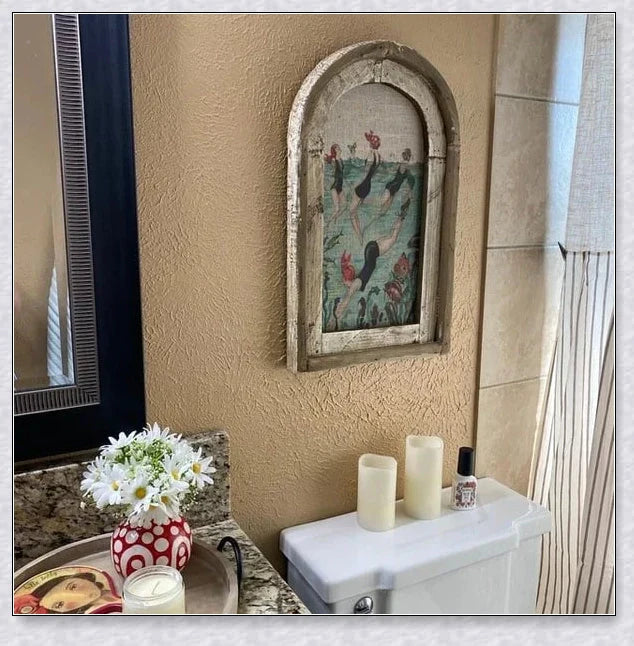 Decorative wall art featuring multiple swimmers and mermaids in a serene, aquatic-themed design