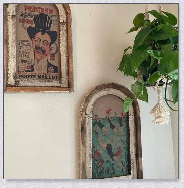 Decorative wall art featuring multiple swimmers and mermaids in a serene, aquatic-themed design
