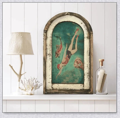 Decorative wall art featuring multiple swimmers and mermaids in a serene, aquatic-themed design