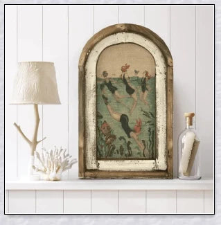 Decorative wall art featuring multiple swimmers and mermaids in a serene, aquatic-themed design