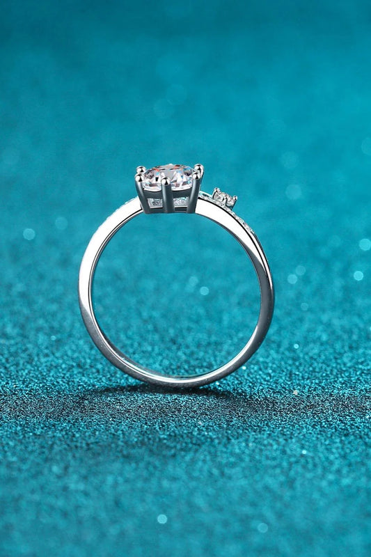 Elegant 925 sterling silver moissanite ring with sparkling centre stone and zircon accents