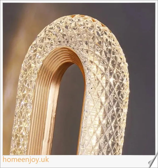 Acrylic table lamp with LED crystal light, featuring a sleek and modern design that elevates any space.