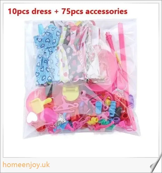 A diverse collection of 85 Barbie doll accessories including colourful dresses, shoes, bags, and jewellery.