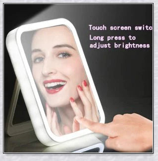 Traby Hand Smart Makeup Mirror with touch screen controls, adjustable brightness, and 45-degree rotation for easy on-the-go beauty touch-ups