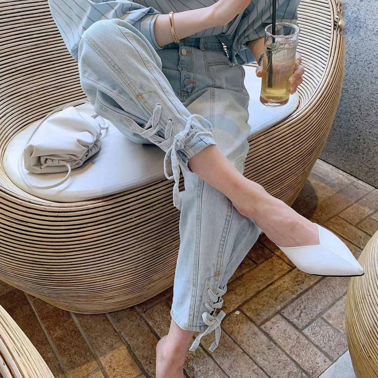 A pair of high-waist, loose, wide-leg jeans made from premium copper material for a stylish and comfortable look.