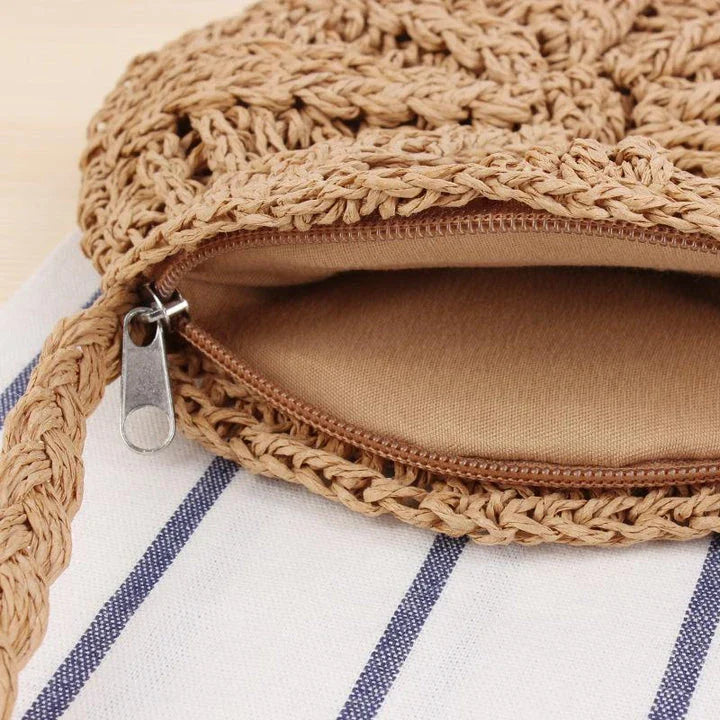 Bohemian rattan round crossbody bag in beige colour with tassel accent