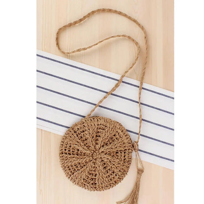 Bohemian rattan round crossbody bag in beige colour with tassel accent