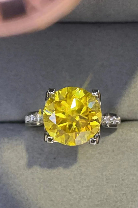 Captivating 5 carat moissanite ring in banana yellow 925 sterling silver, featuring a minimalist and timeless design.