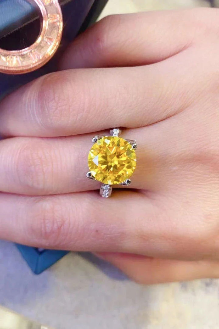 Captivating 5 carat moissanite ring in banana yellow 925 sterling silver, featuring a minimalist and timeless design.
