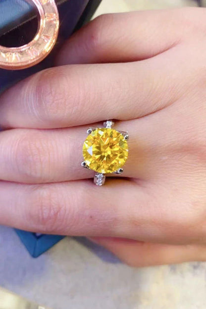 Captivating 5 carat moissanite ring in banana yellow 925 sterling silver, featuring a minimalist and timeless design.