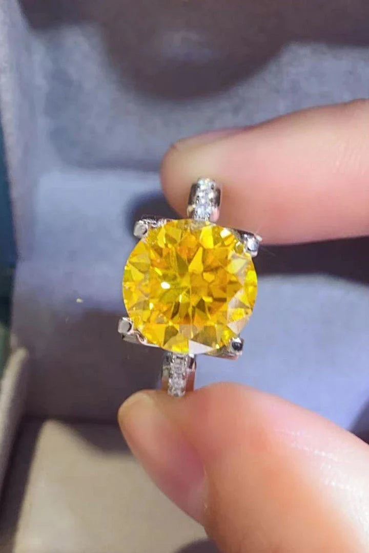 Captivating 5 carat moissanite ring in banana yellow 925 sterling silver, featuring a minimalist and timeless design.
