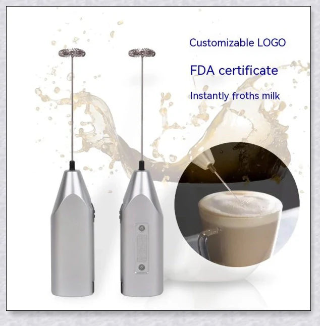 A compact, stainless steel milk frother with a modern, minimalist design, perfect for creating rich, velvety milk foam for coffee and tea drinks.