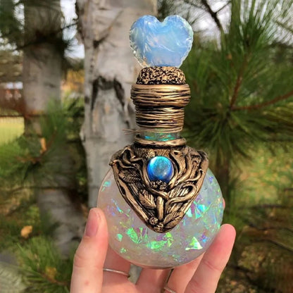 Shimmering resin ornament featuring a mesmerising mermaid design and glowing crescent moon