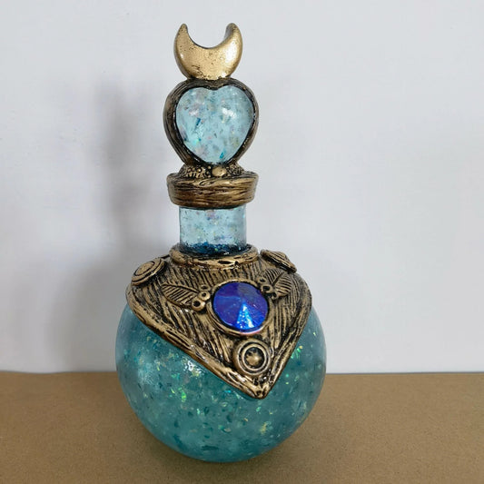Shimmering resin ornament featuring a mesmerising mermaid design and glowing crescent moon