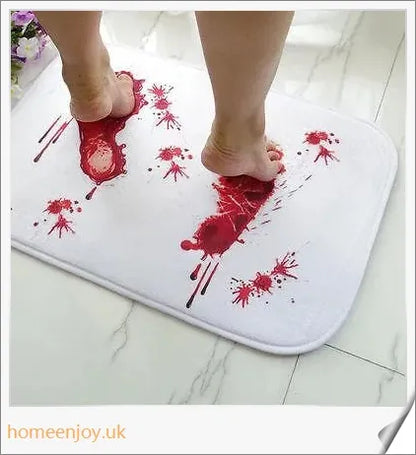 Bloody Bath Mat - A vibrant crimson bath mat made with durable 100% polyester for a bold and playful bathroom statement