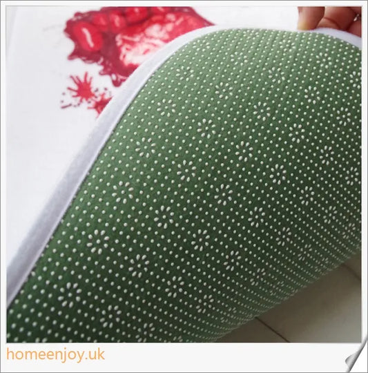 Bloody Bath Mat - A vibrant crimson bath mat made with durable 100% polyester for a bold and playful bathroom statement